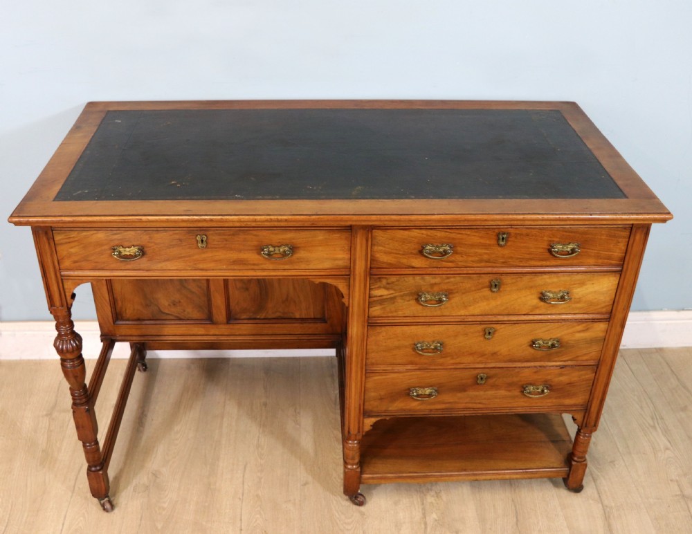 A lovely late 19th century aesthetic movement walnut desk View II