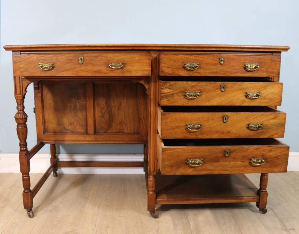 A lovely late 19th century aesthetic movement walnut desk View III