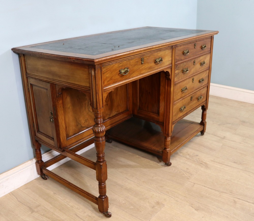 A lovely late 19th century aesthetic movement walnut desk View V
