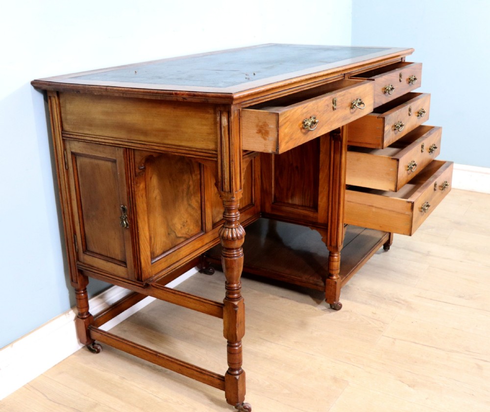 A lovely late 19th century aesthetic movement walnut desk View VI