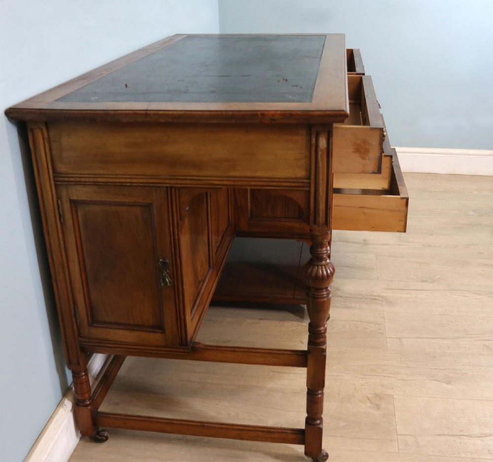 A lovely late 19th century aesthetic movement walnut desk View VIII