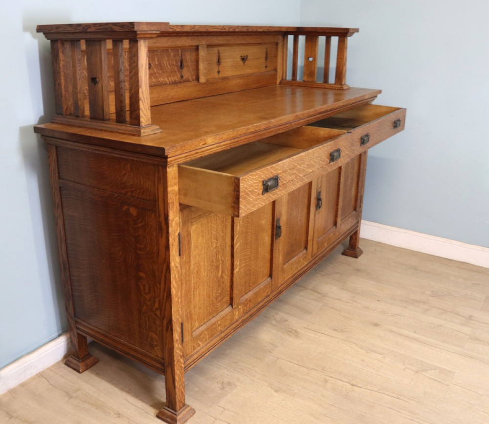 A lovely late Victorian solid light oak sideboard  View V