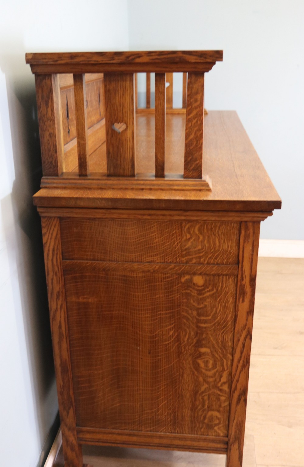 A lovely late Victorian solid light oak sideboard  View VII