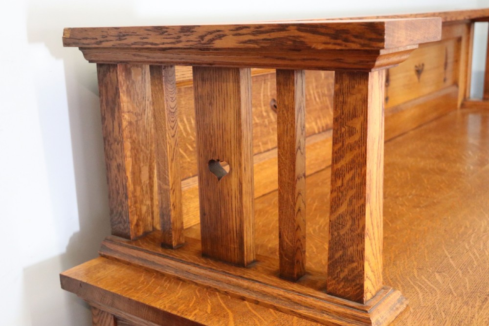 A lovely late Victorian solid light oak sideboard  View XII