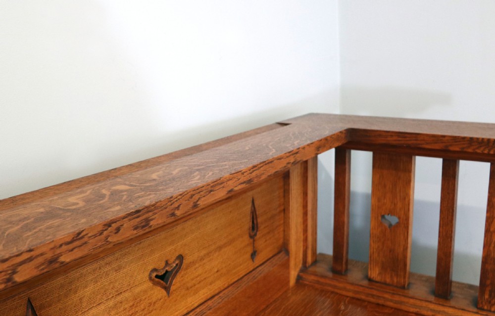 A lovely late Victorian solid light oak sideboard  View XVII