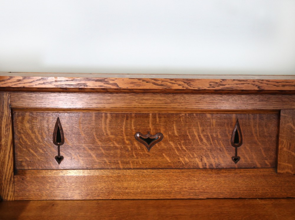 A lovely late Victorian solid light oak sideboard  View XXII