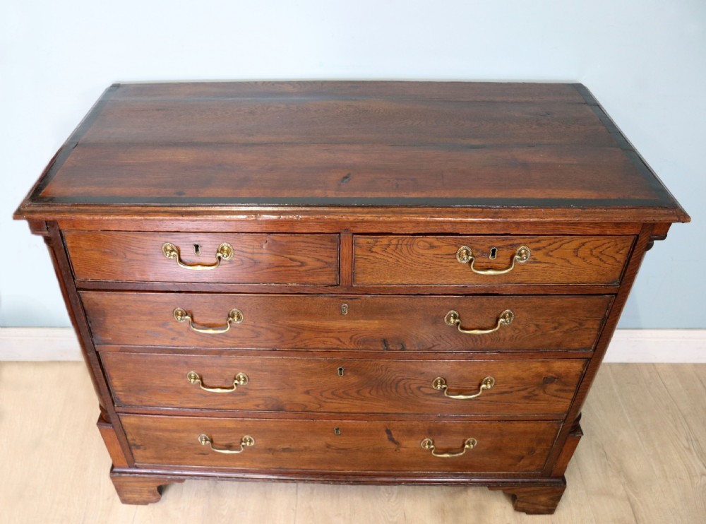 A lovely George III oak and mahogany crossbanded chest View III