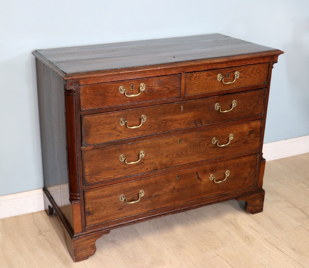 A lovely George III oak and mahogany crossbanded chest View IV