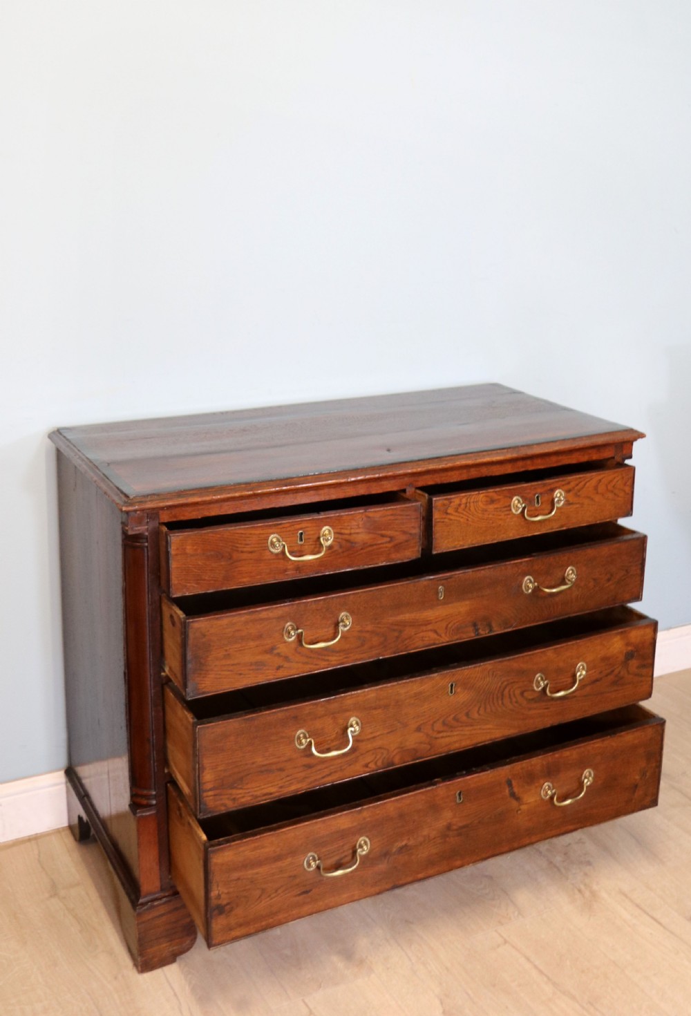 A lovely George III oak and mahogany crossbanded chest View V