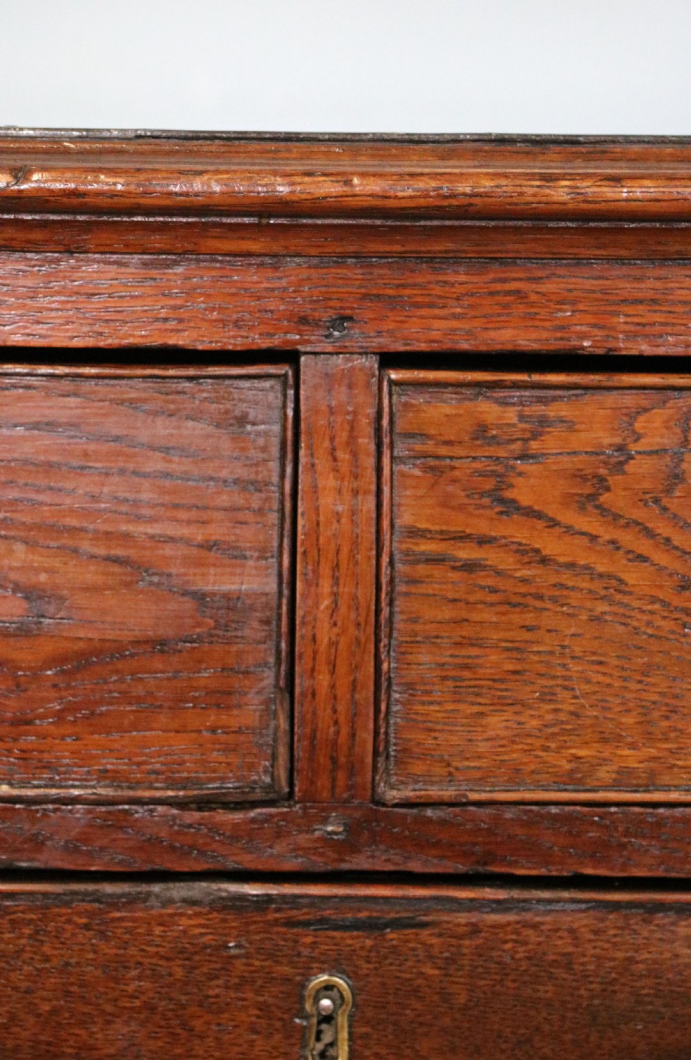 A lovely George III oak and mahogany crossbanded chest View X