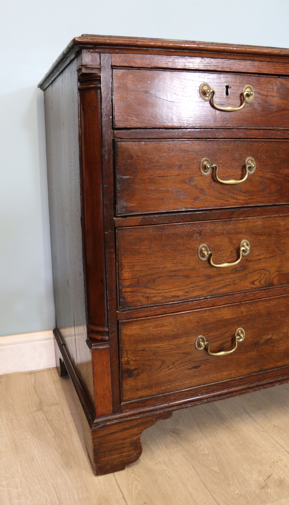 A lovely George III oak and mahogany crossbanded chest View XI