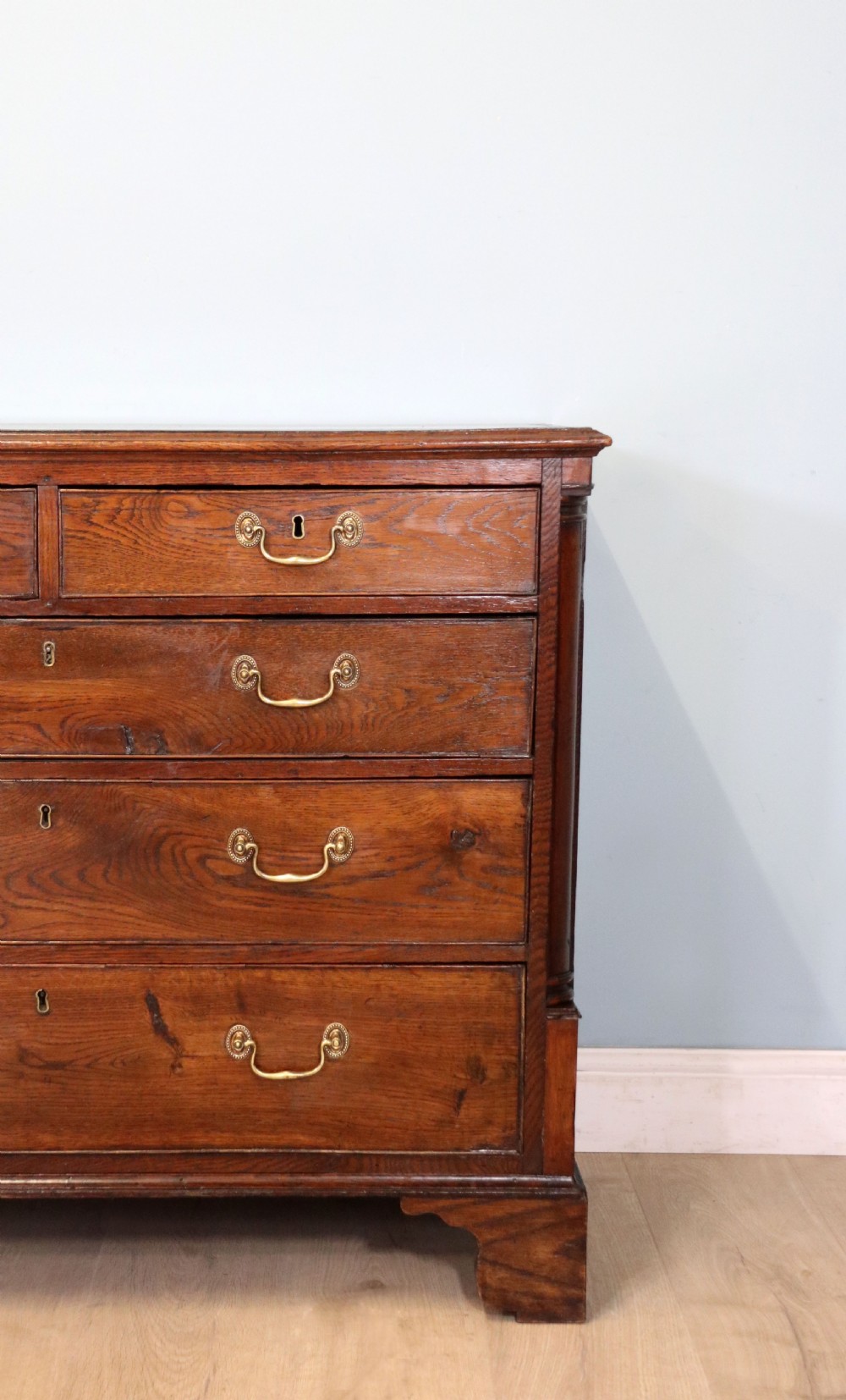 A lovely George III oak and mahogany crossbanded chest View XII