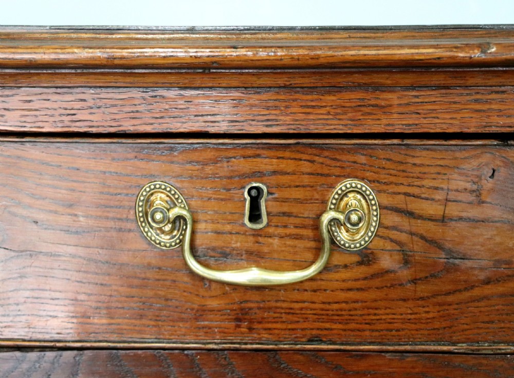 A lovely George III oak and mahogany crossbanded chest View XV