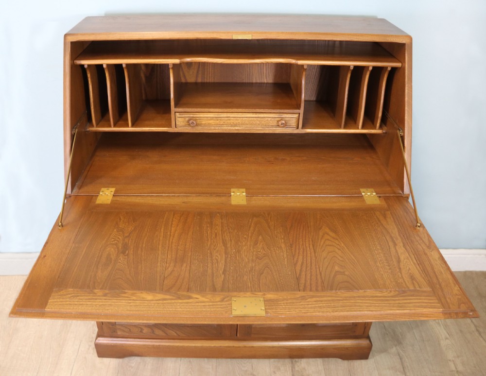  A lovely piece of modern Ercol light elm bureau. View III