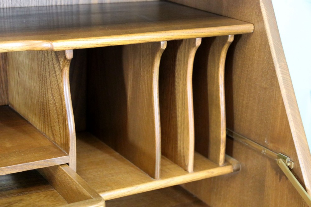  A lovely piece of modern Ercol light elm bureau. View XV