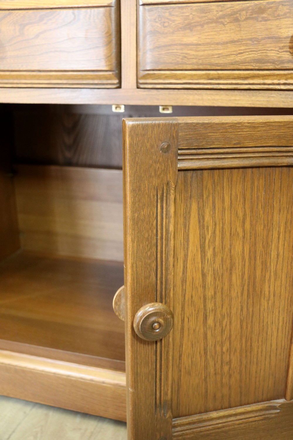  A lovely piece of modern Ercol light elm bureau. View XXIII