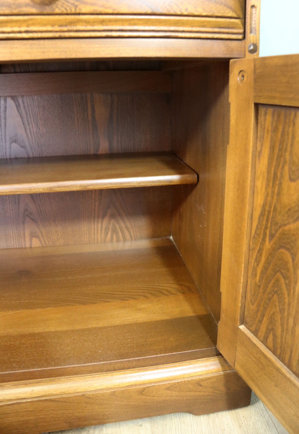  A lovely piece of modern Ercol light elm bureau. View XXIV