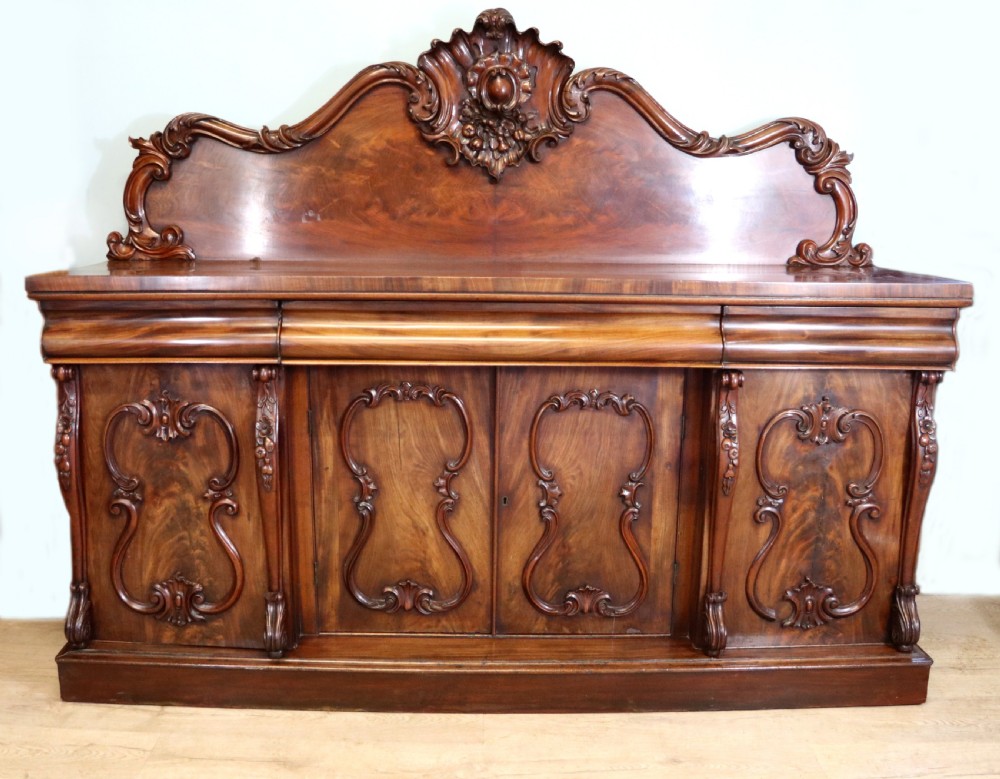 A superb antique mahogany sideboard of large proportions. 