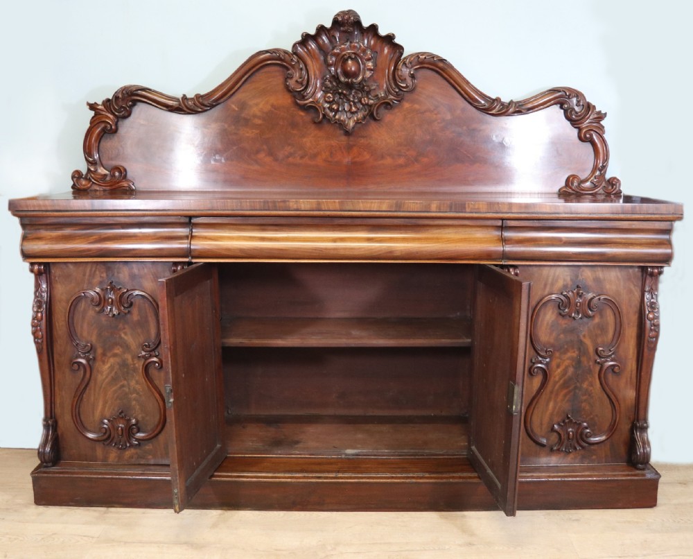 A superb antique mahogany sideboard of large proportions.  View III