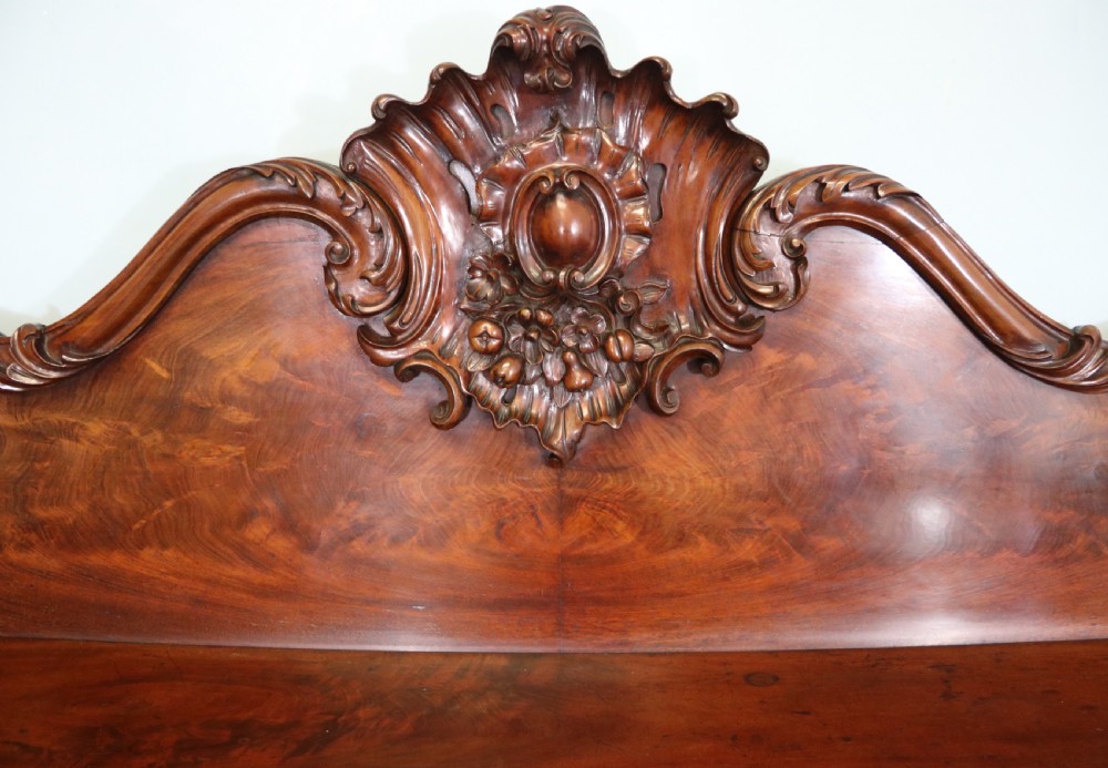 A superb antique mahogany sideboard of large proportions.  View IX