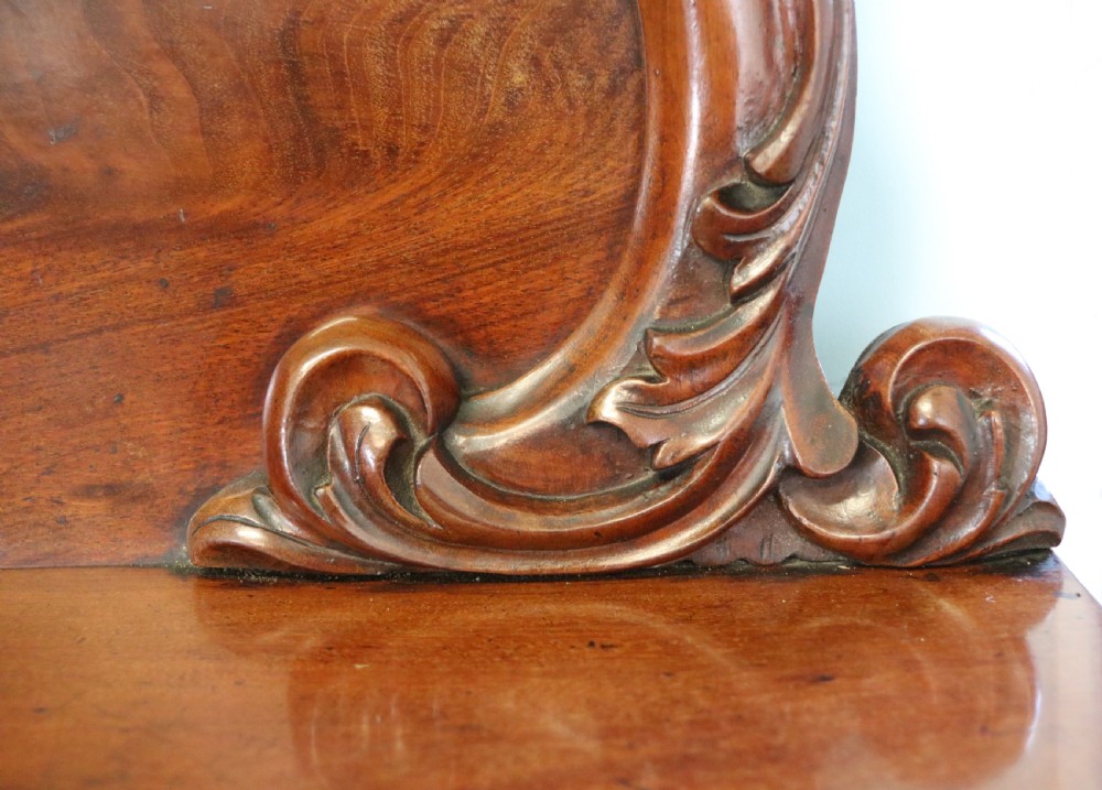 A superb antique mahogany sideboard of large proportions.  View XVII