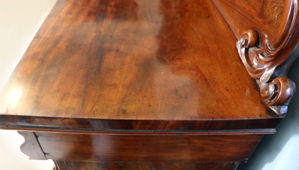 A superb antique mahogany sideboard of large proportions.  View XIX