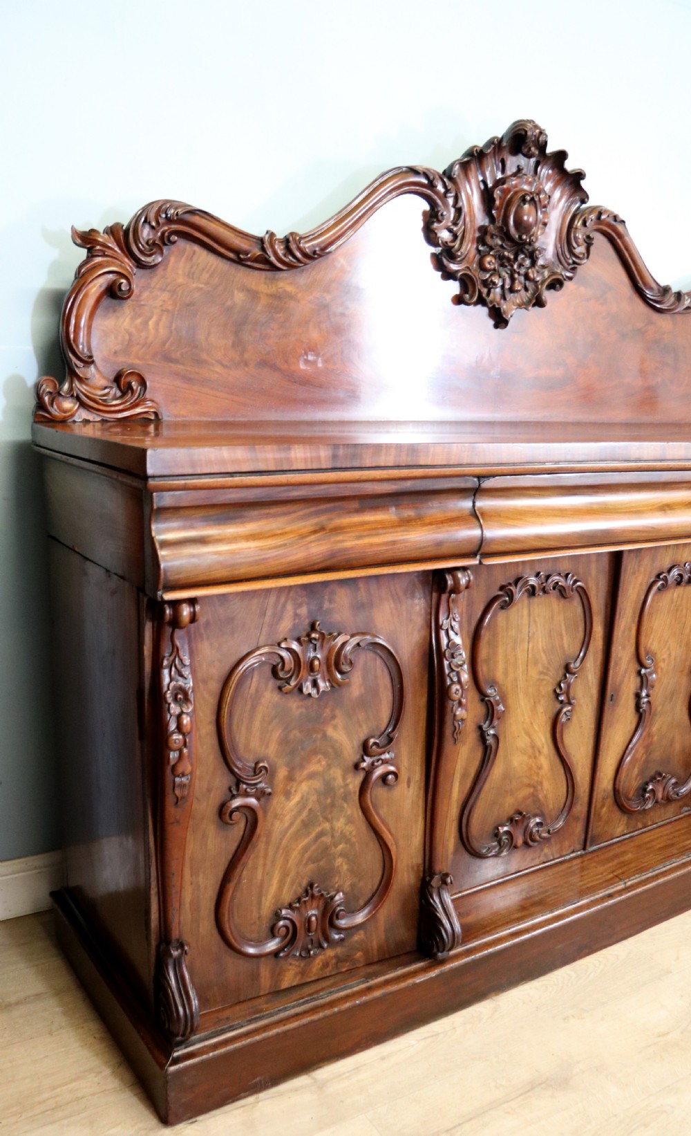 A superb antique mahogany sideboard of large proportions.  View XXI