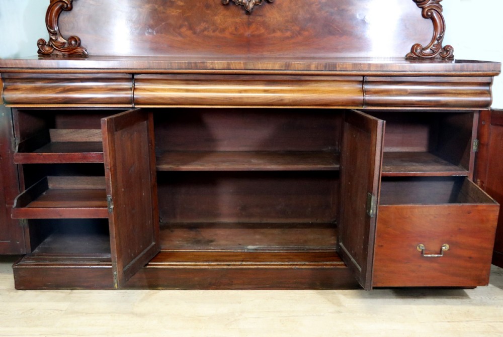 A superb antique mahogany sideboard of large proportions.  View XXII