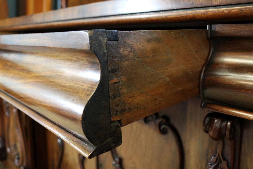 A superb antique mahogany sideboard of large proportions.  View XXIII