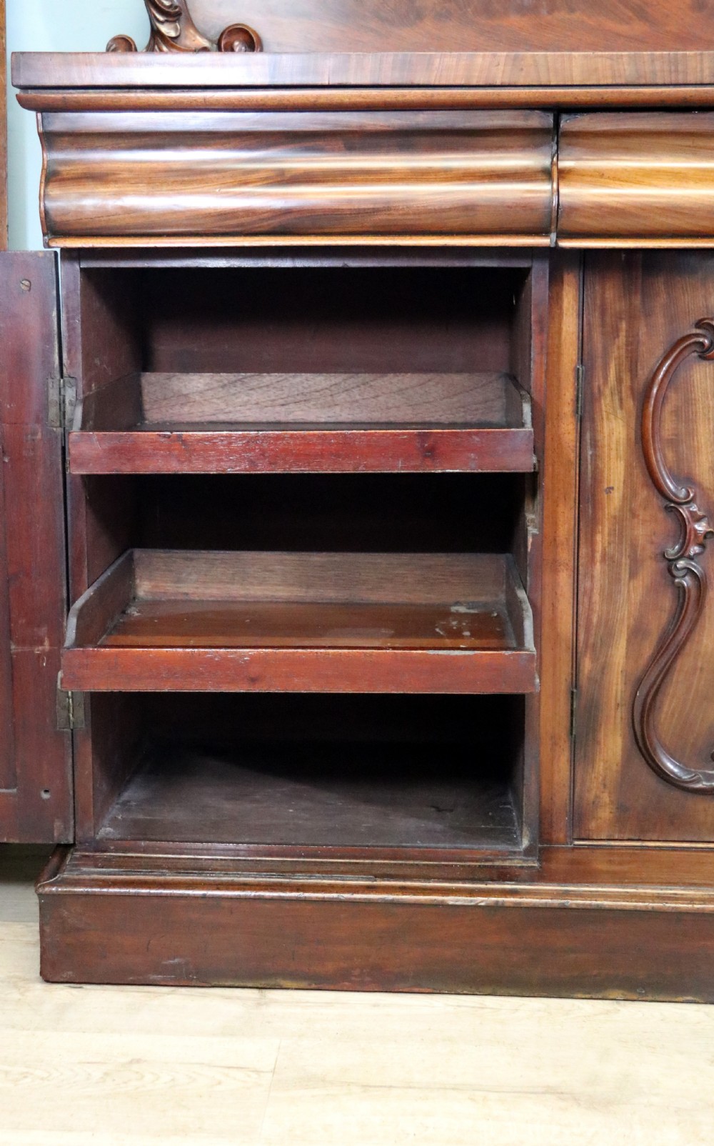 A superb antique mahogany sideboard of large proportions.  View XXVII