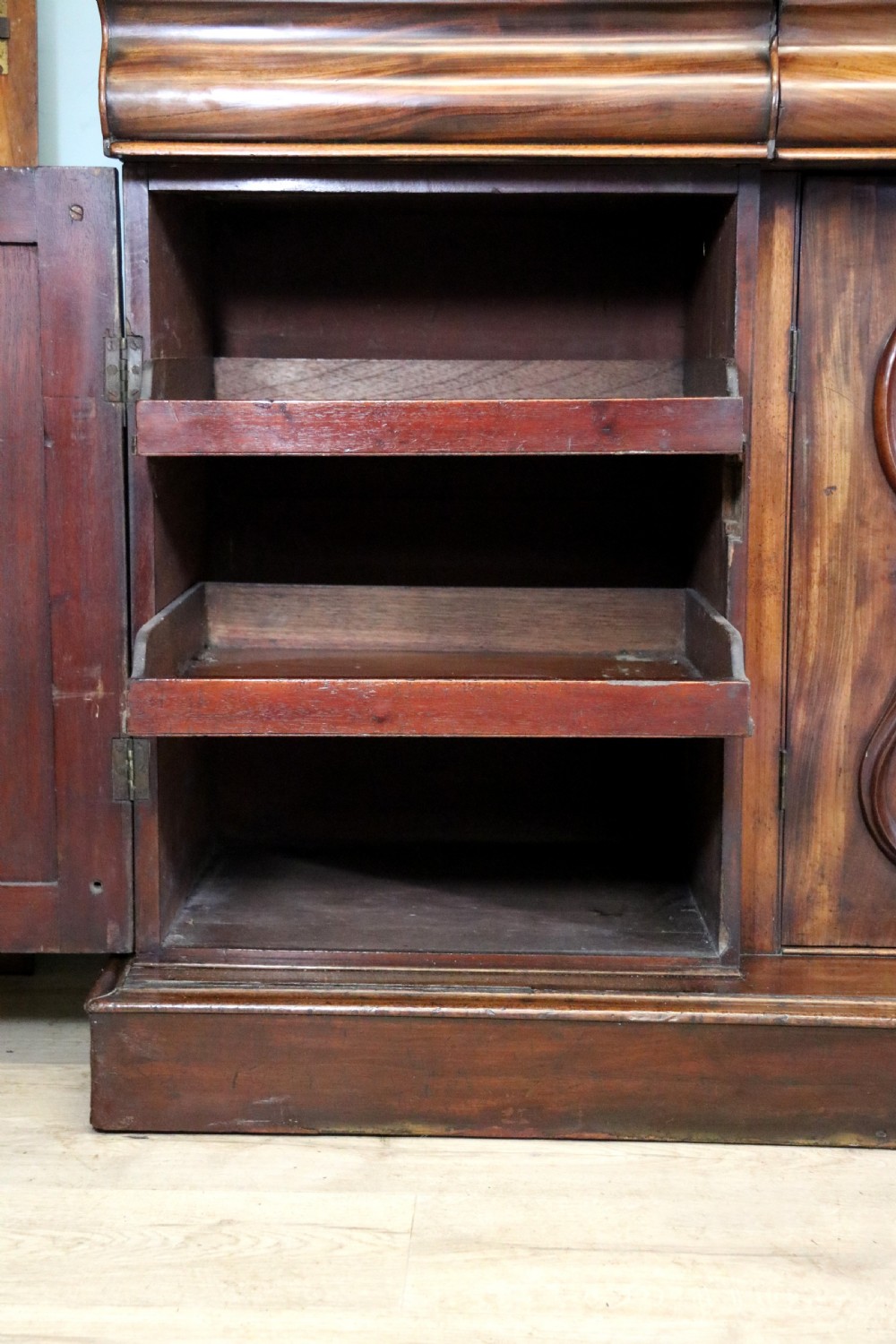 A superb antique mahogany sideboard of large proportions.  View XXVIII