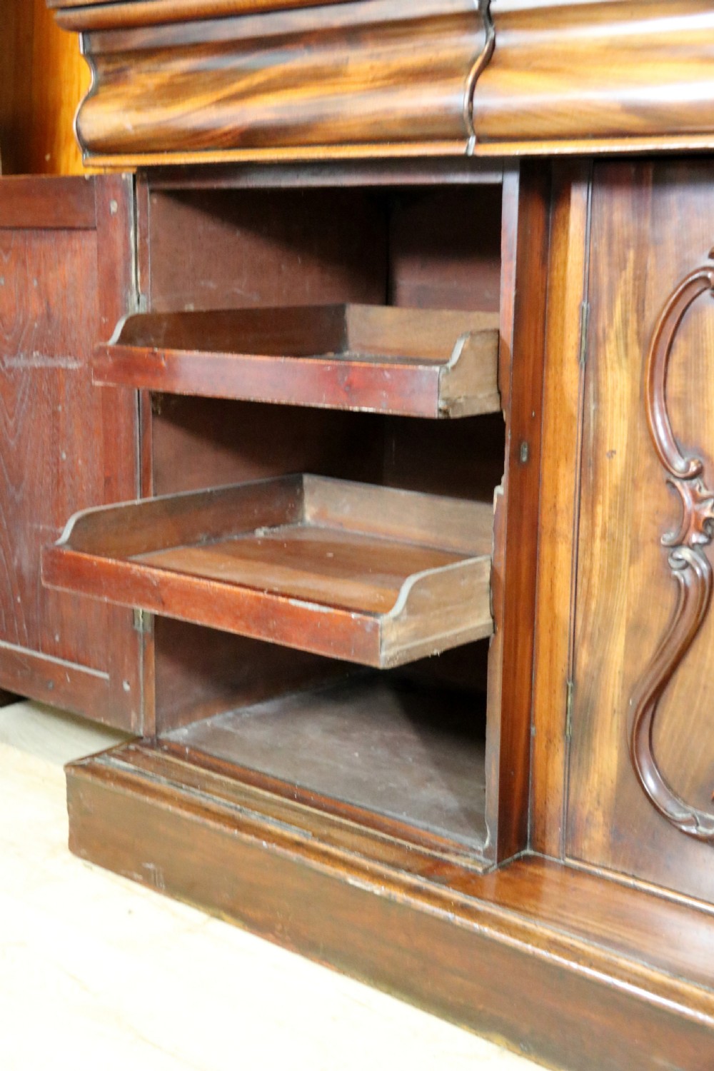 A superb antique mahogany sideboard of large proportions.  View XXIX