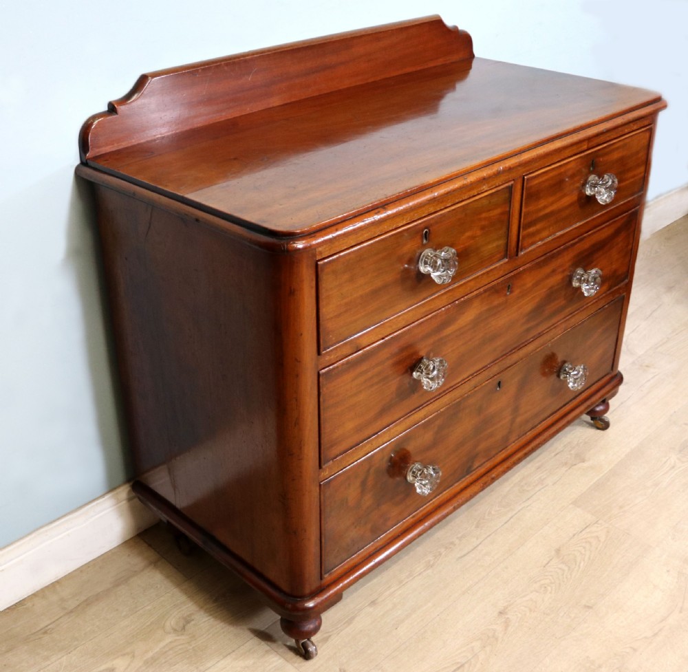 A quality Victorian mahogany chest of drawers.  View IV