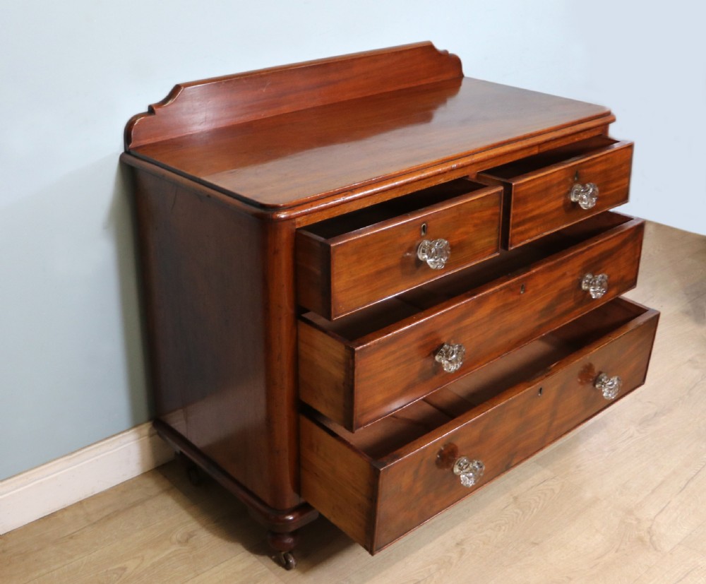 A quality Victorian mahogany chest of drawers.  View VI