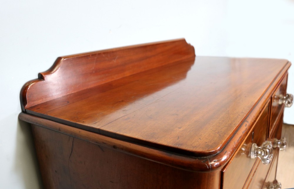 A quality Victorian mahogany chest of drawers.  View IX