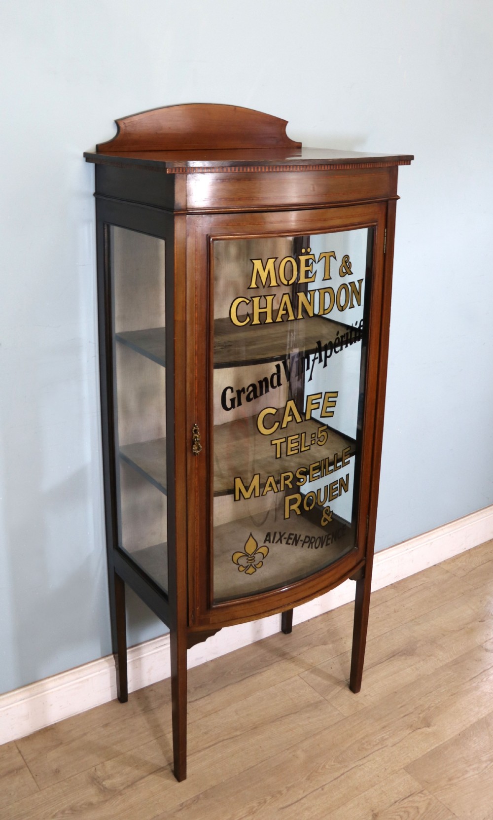 A lovely Edwardian mahogany framed bow fronted display cabinet. View III