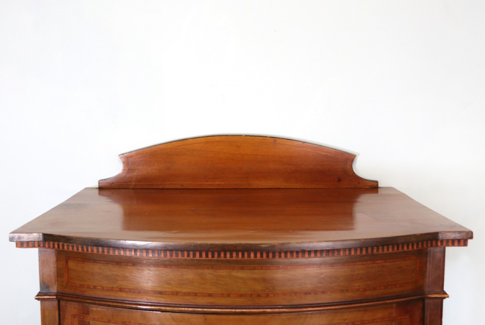 A lovely Edwardian mahogany framed bow fronted display cabinet. View XI