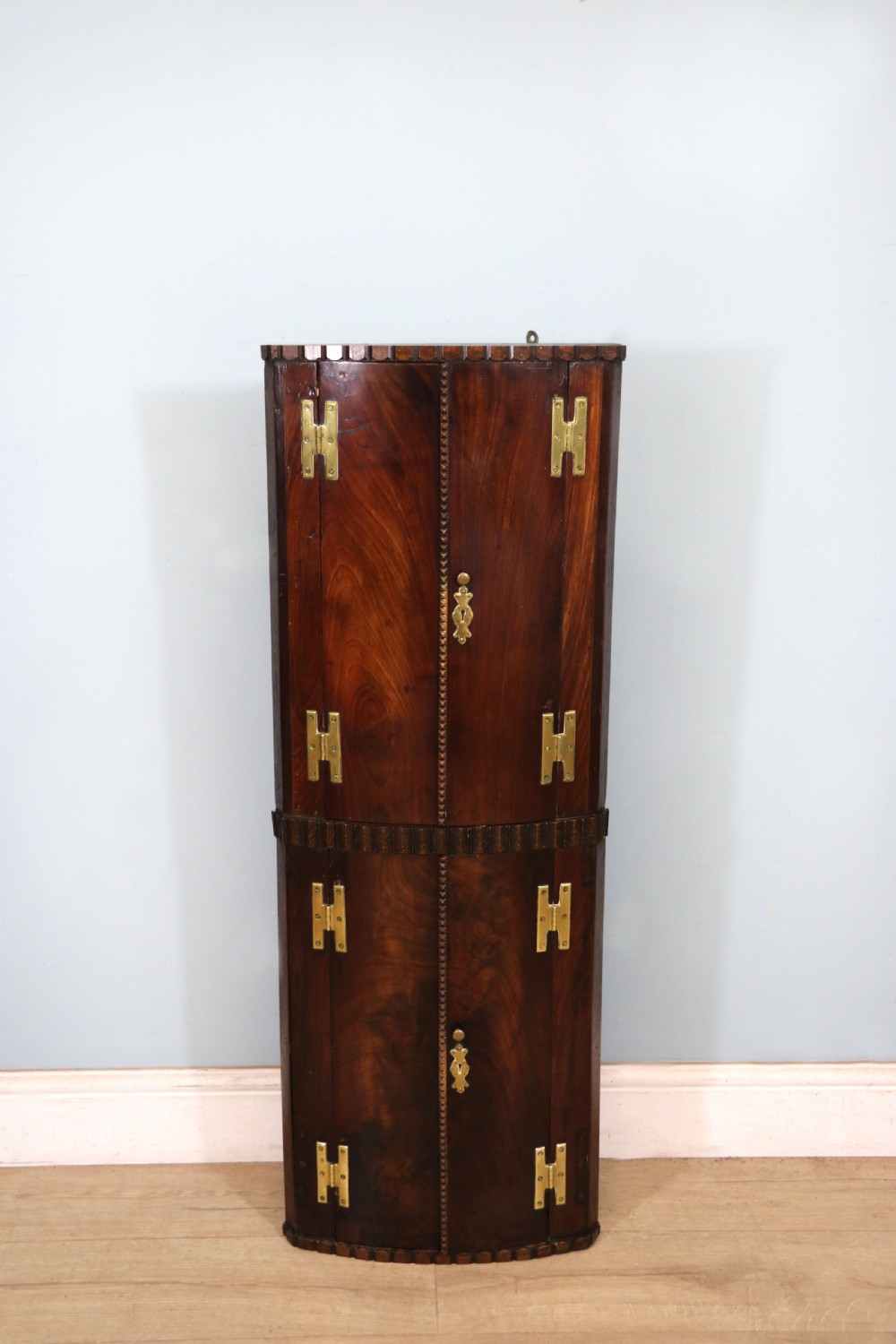  A lovely & extremely unusual Georgian bow front four door corner cabinet. View III