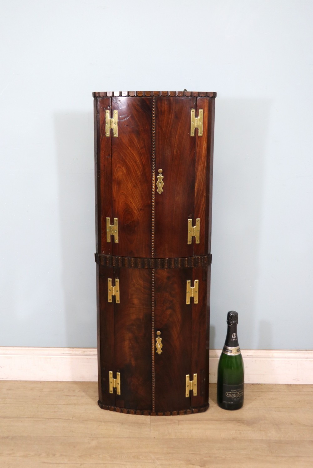  A lovely & extremely unusual Georgian bow front four door corner cabinet. View II