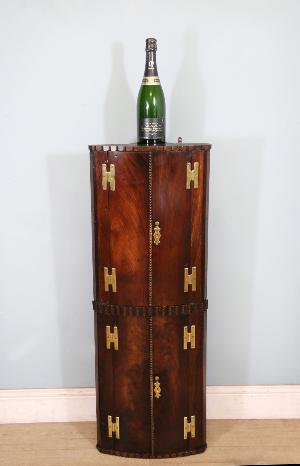  A lovely & extremely unusual Georgian bow front four door corner cabinet.