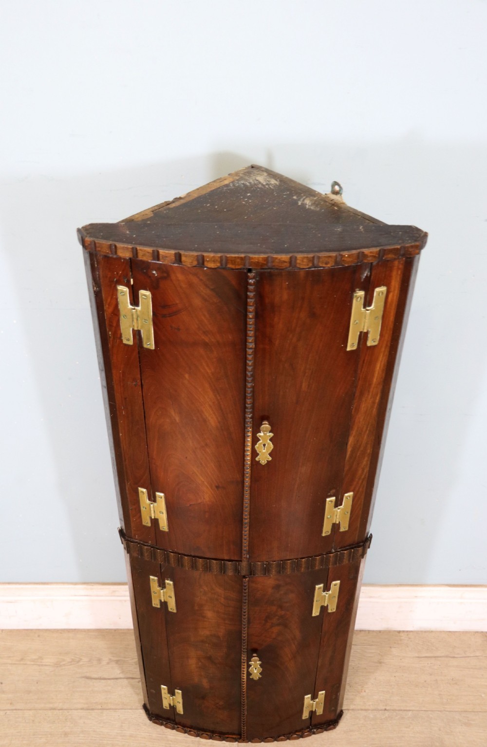 A lovely & extremely unusual Georgian bow front four door corner cabinet. View IV