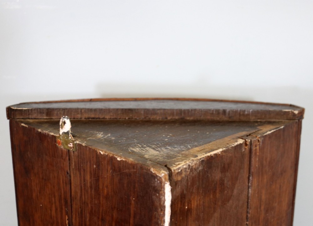  A lovely & extremely unusual Georgian bow front four door corner cabinet. View X