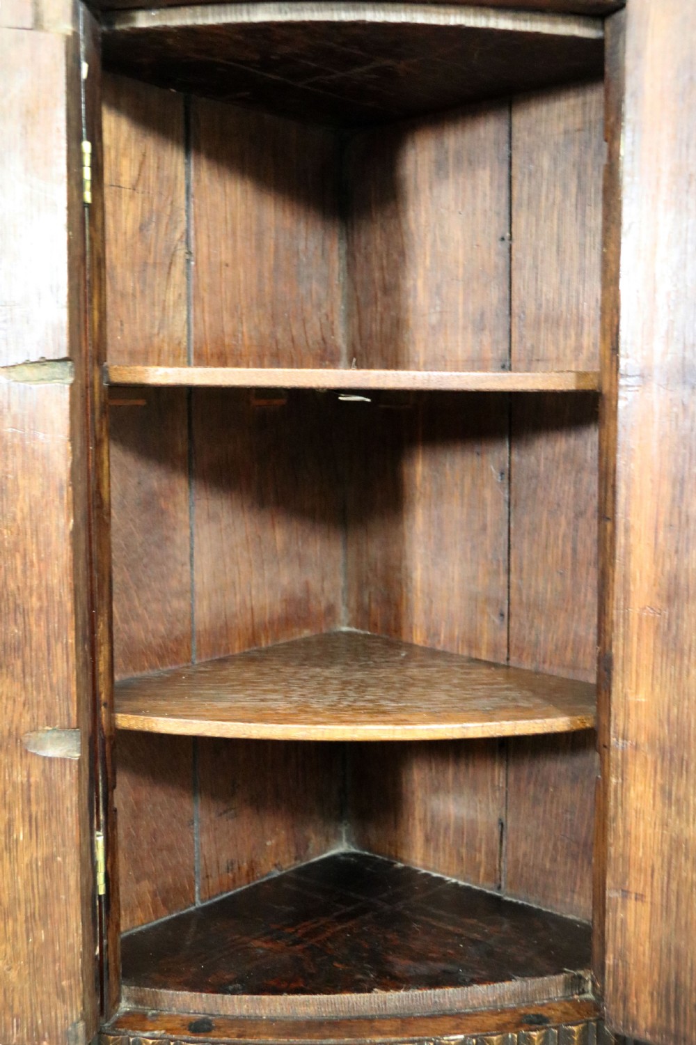  A lovely & extremely unusual Georgian bow front four door corner cabinet. View XVII