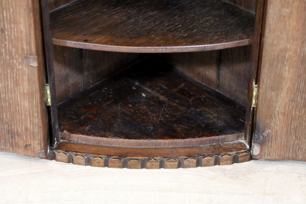  A lovely & extremely unusual Georgian bow front four door corner cabinet. View XIX