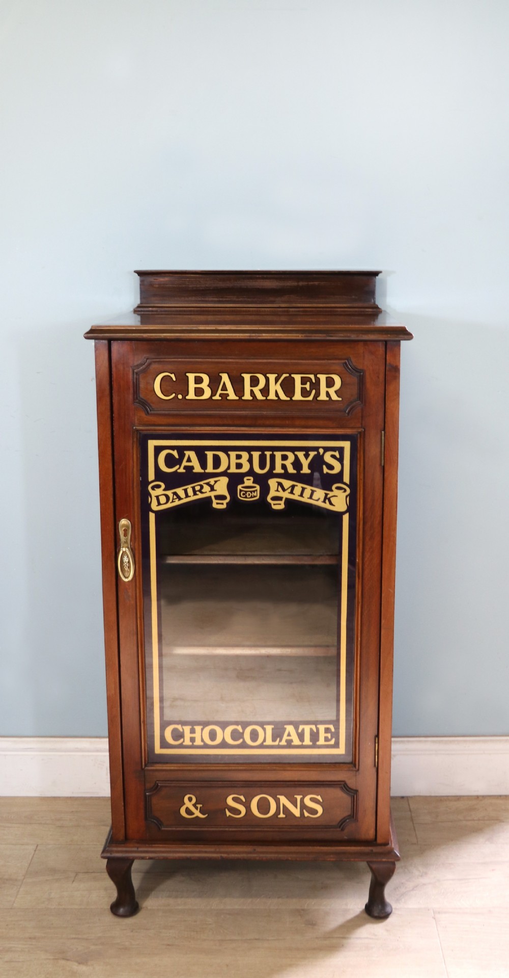 A lovely late Victorian glazed side cabinet sign written for Cadburys chocolate. 