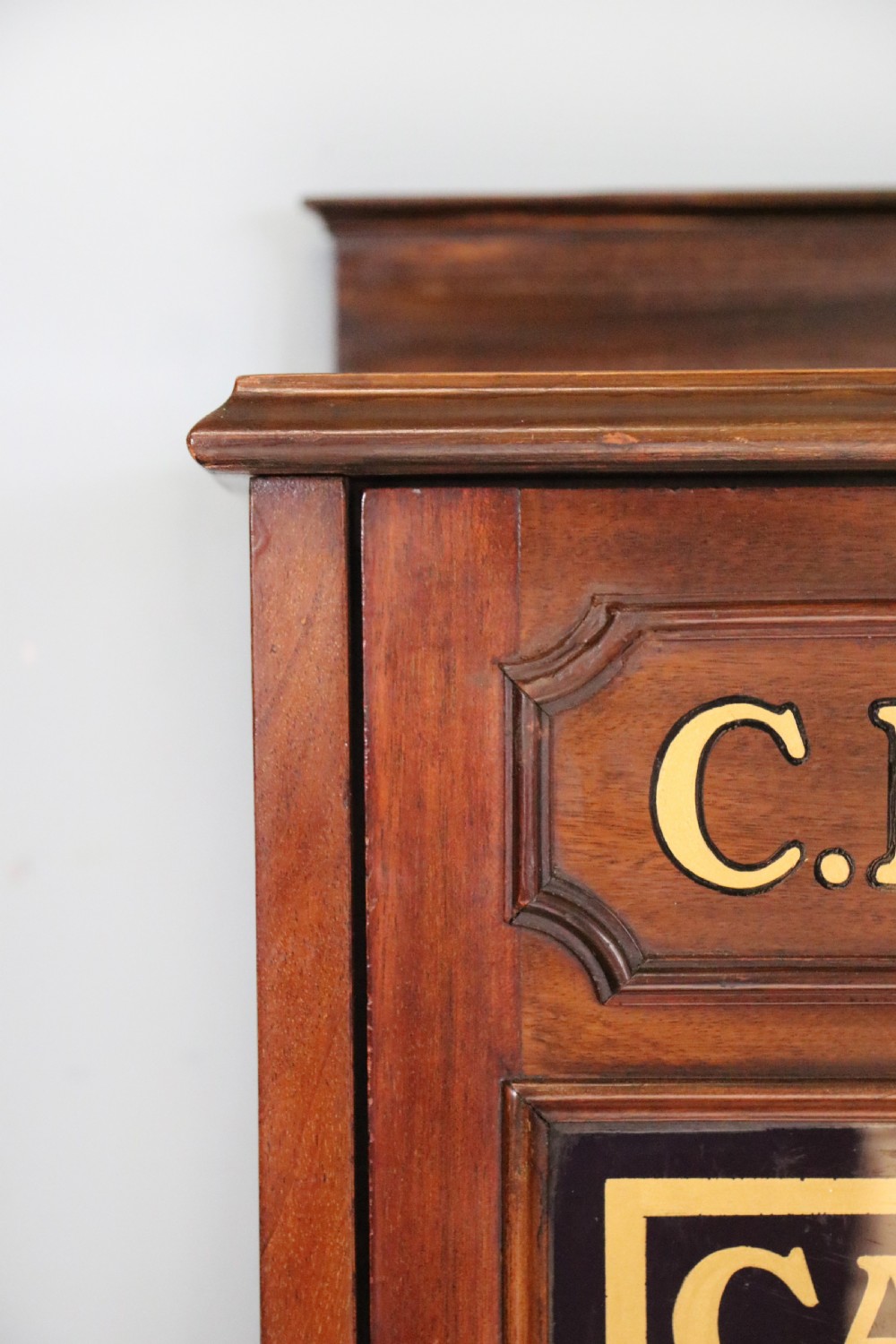 A lovely late Victorian glazed side cabinet sign written for Cadburys chocolate.  View VII