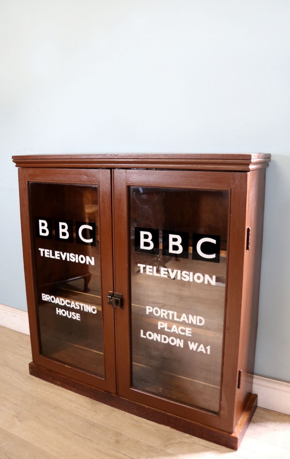 A lovely functional mid-century glazed bookcase cabinet sign written for the British Broadcasting company (BBC).  View III