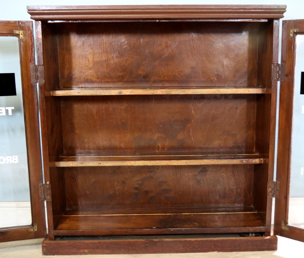 A lovely functional mid-century glazed bookcase cabinet sign written for the British Broadcasting company (BBC).  View IV