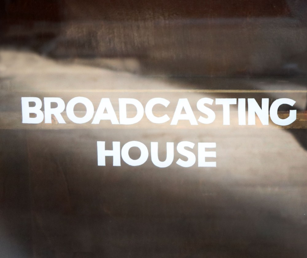 A lovely functional mid-century glazed bookcase cabinet sign written for the British Broadcasting company (BBC).  View VI