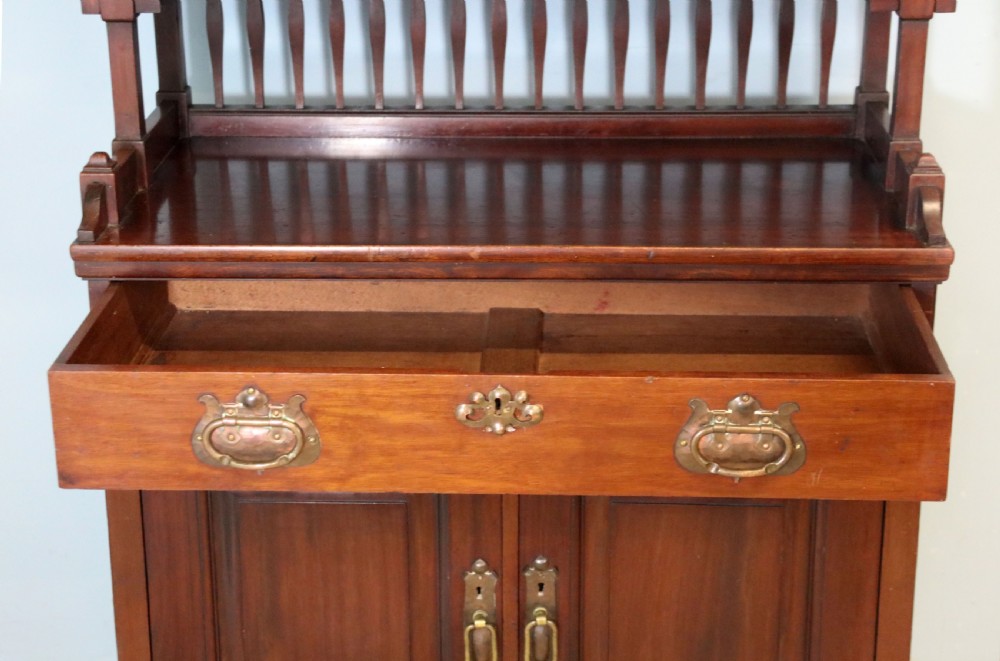 A lovely Arts & Crafts style side cabinet. View XVIII